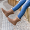 Bota barefoot ergonomica chocolate modelo Bear para adultos en uso